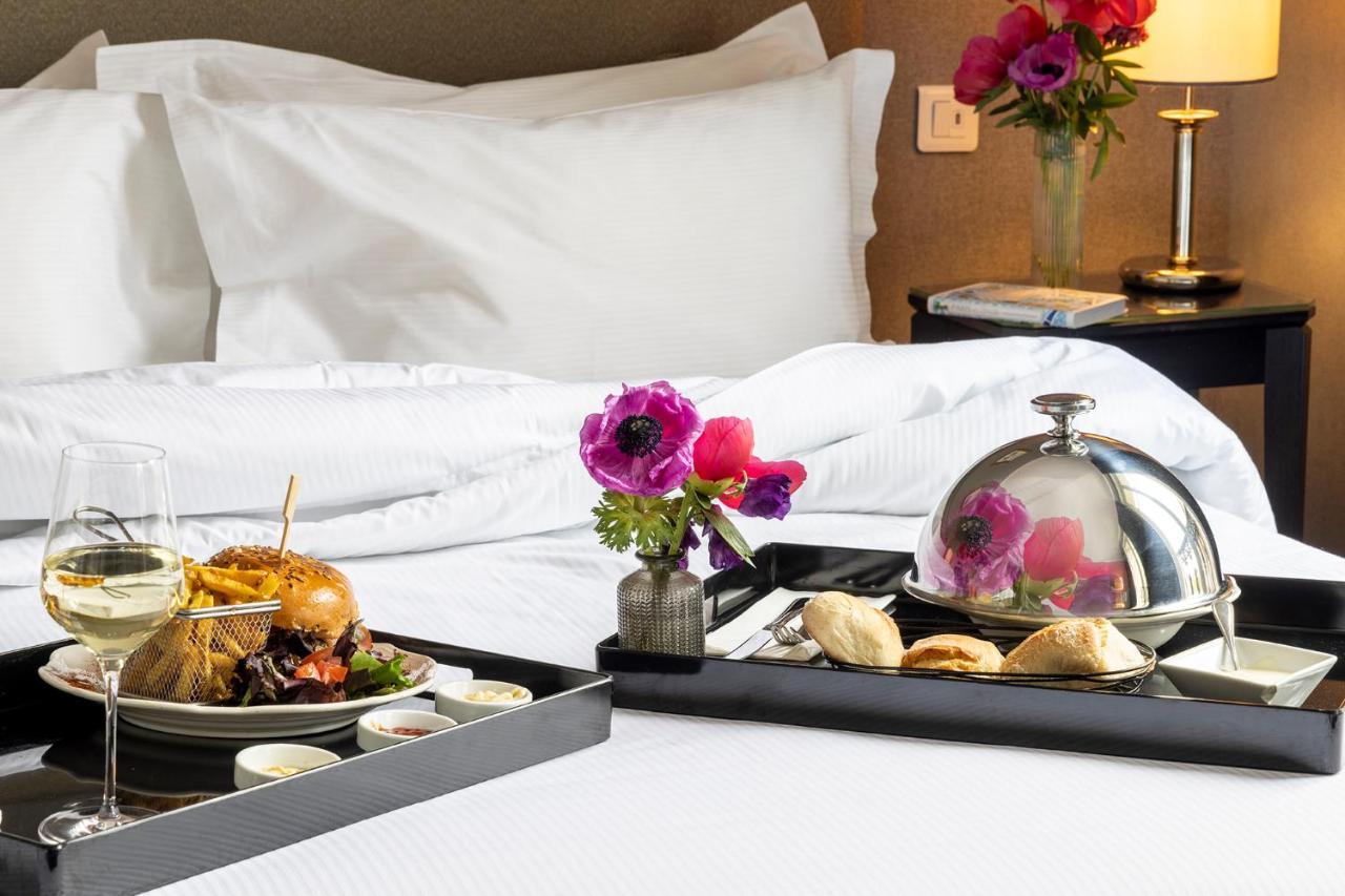 ม๊าดแลน พลาซ่า โอแตล Hotel ปารีส ภายนอก รูปภาพ